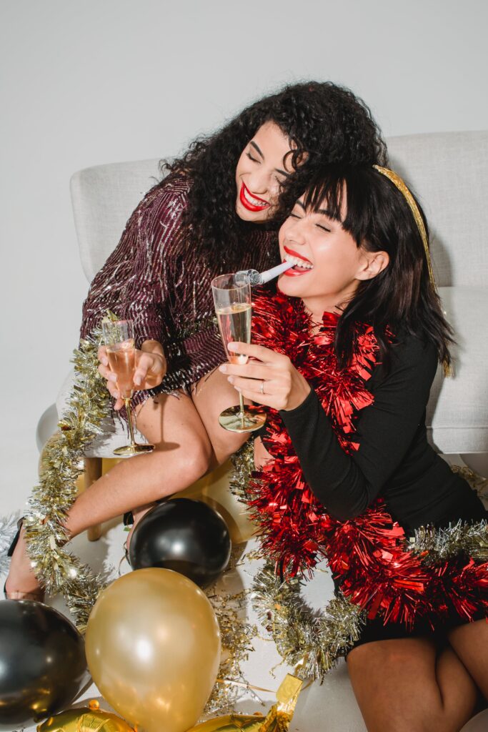 2 women on new year's eve with fab hairstyle